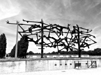 While obviously not a portrait of a person, this Dachau monument represents the many people who suffered and died there -- Dachau, Germany